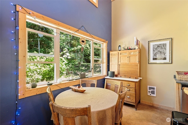 dining area with light carpet