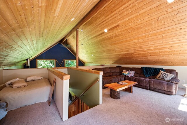 carpeted bedroom with wood ceiling and vaulted ceiling