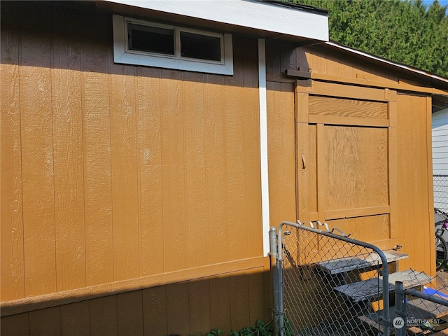 view of outdoor structure with fence