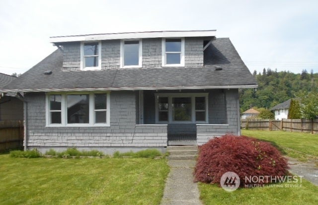 view of front of home with a front yard