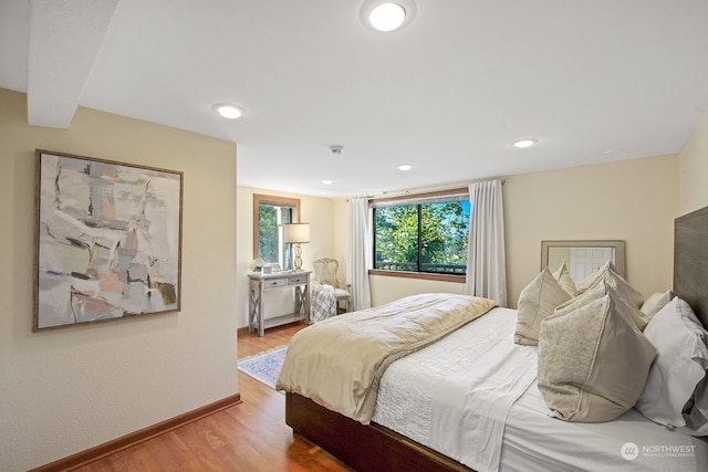 bedroom featuring hardwood / wood-style floors