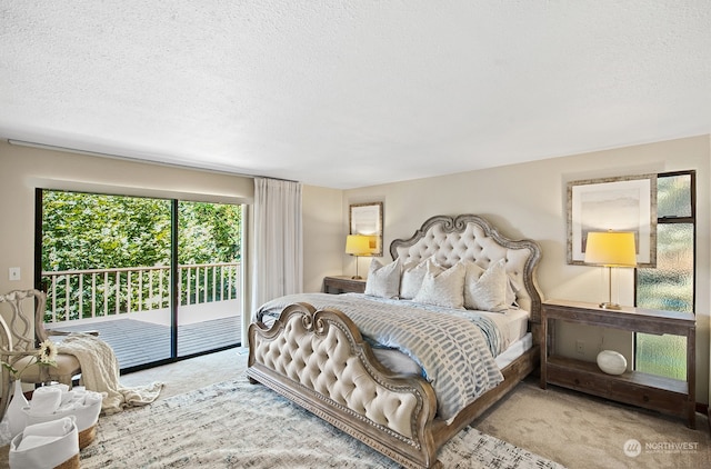 bedroom with light colored carpet, access to outside, and a textured ceiling