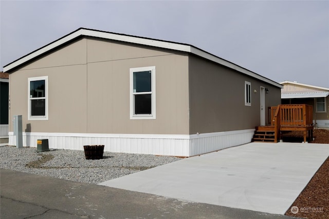 1400 Samuel Dr, Walla Walla, WA 99362 - view of side of home featuring a wooden deck and a patio area