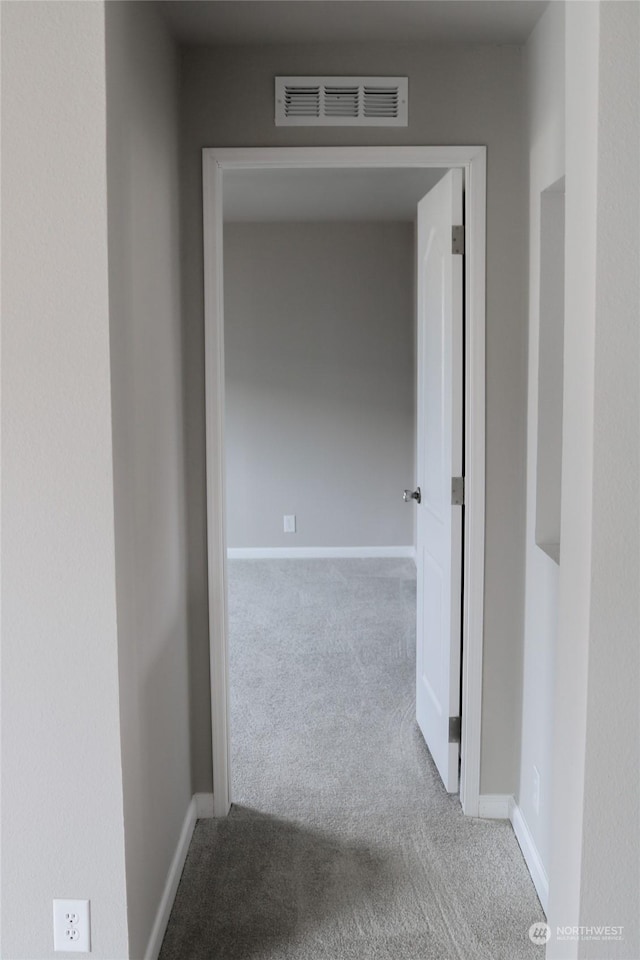 1400 Samuel Dr, Walla Walla, WA 99362 - hallway featuring visible vents, baseboards, and carpet floors