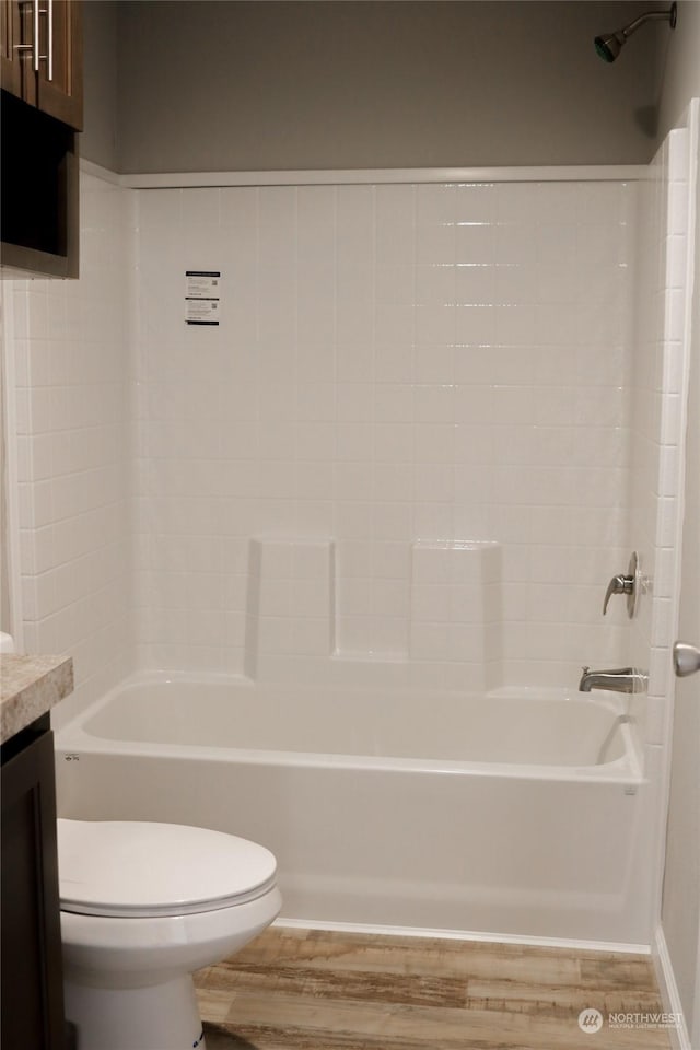1400 Samuel Dr, Walla Walla, WA 99362 - bathroom featuring toilet, shower / bath combination, vanity, and wood finished floors