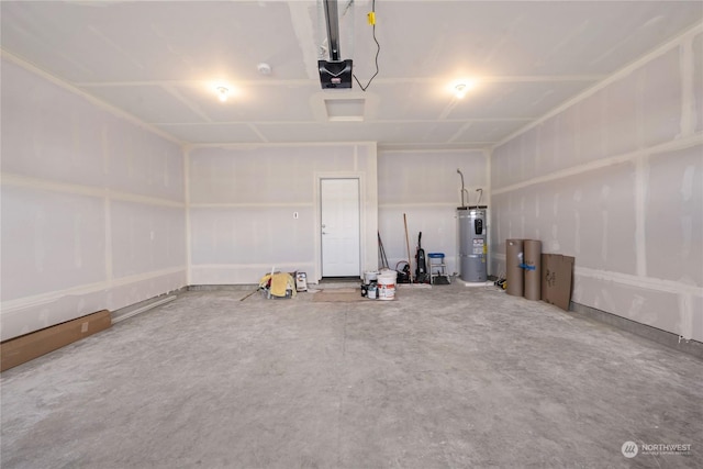 garage featuring a garage door opener and electric water heater