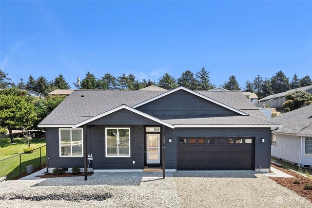 view of front of home featuring a garage