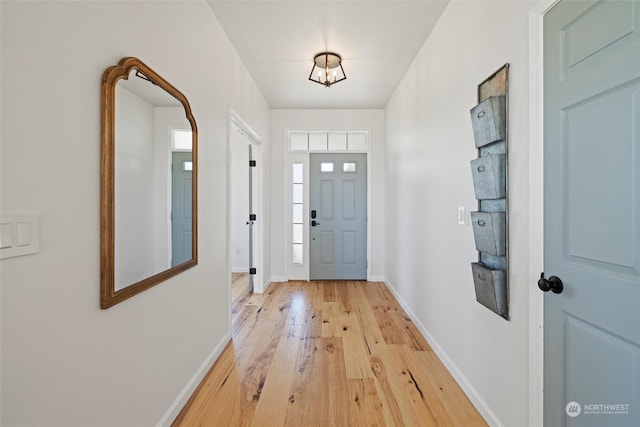 doorway to outside featuring light hardwood / wood-style flooring