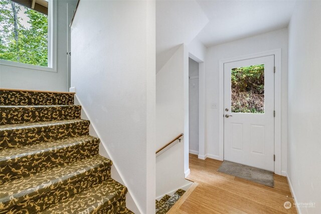 foyer entrance featuring light wood-type flooring