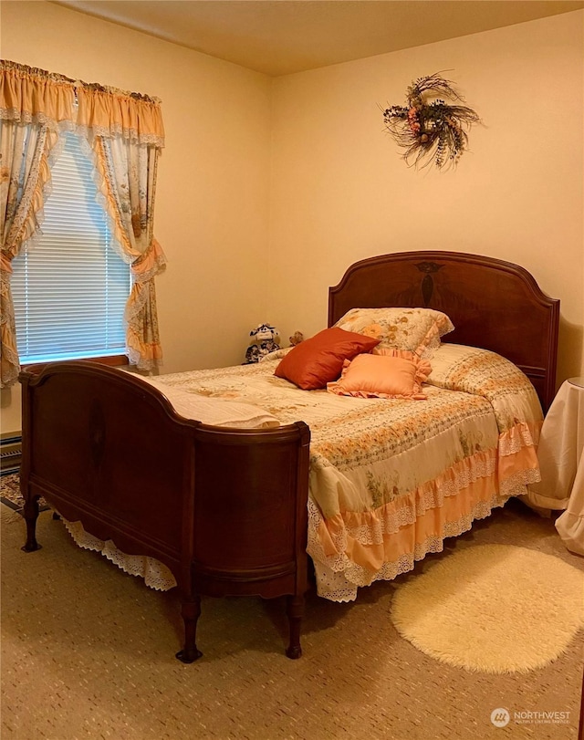 bedroom featuring baseboard heating