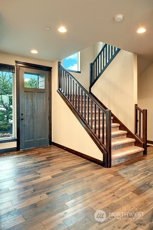 foyer entrance featuring hardwood / wood-style floors