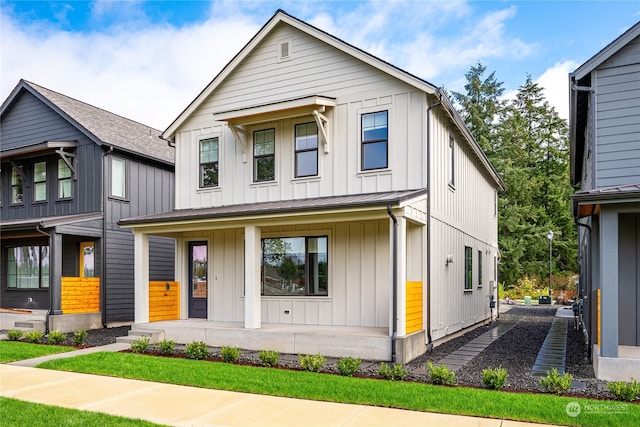 modern farmhouse style home with a porch