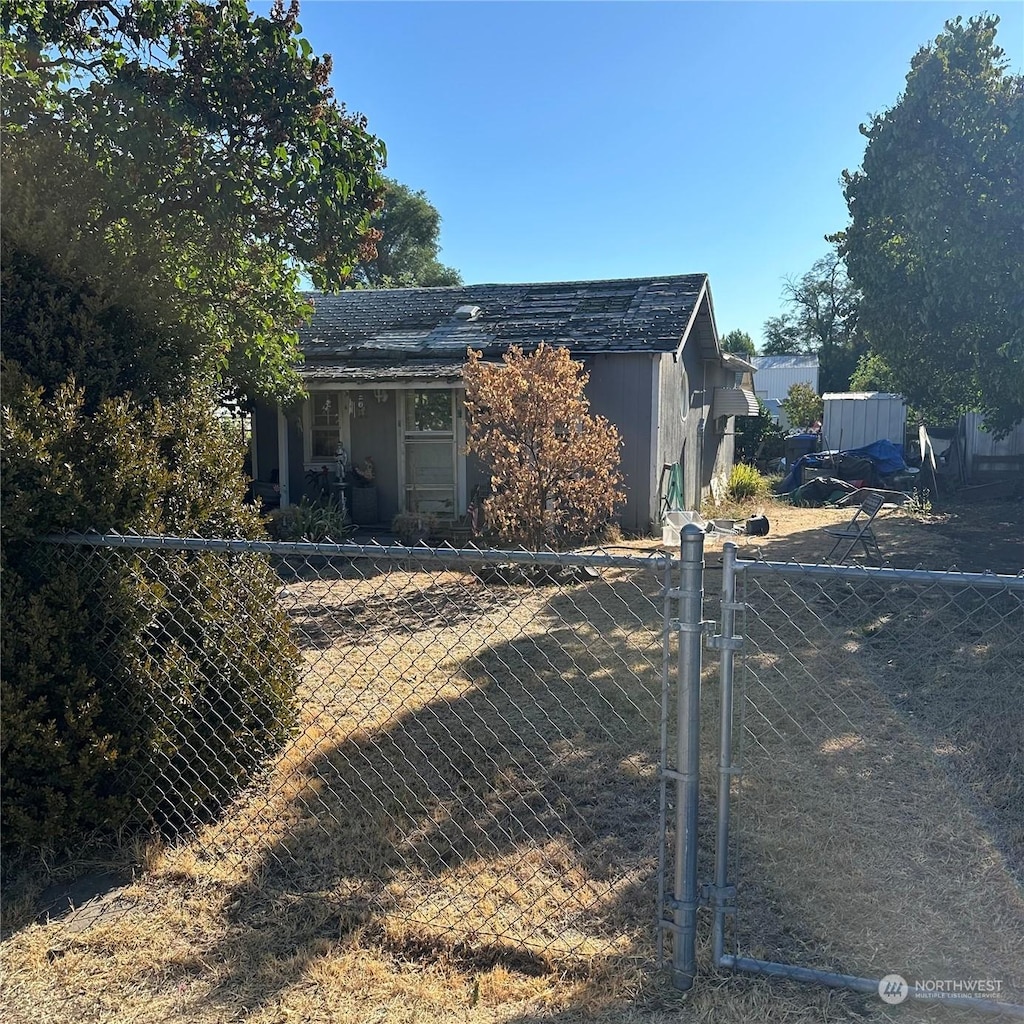 view of property exterior featuring fence