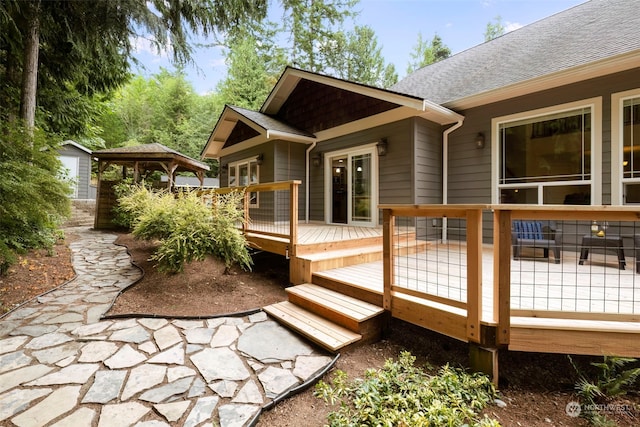 wooden deck featuring a gazebo