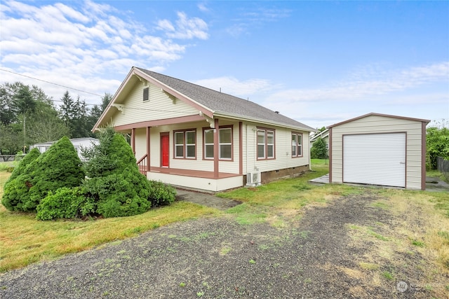 view of side of property featuring an outbuilding and a garage