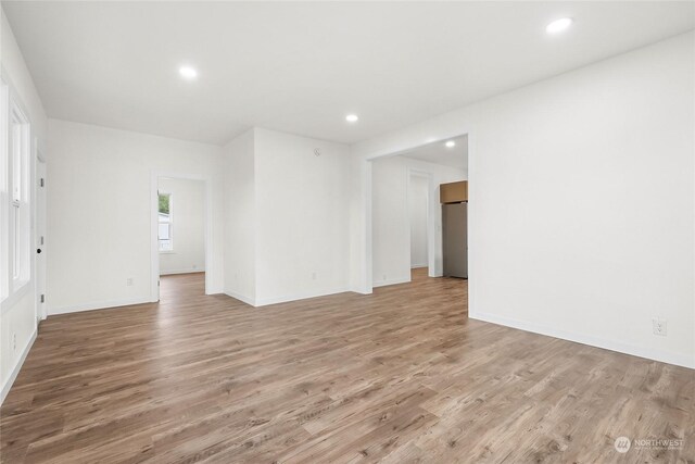 spare room featuring hardwood / wood-style floors