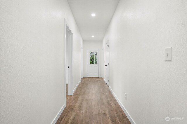 hallway featuring light hardwood / wood-style floors