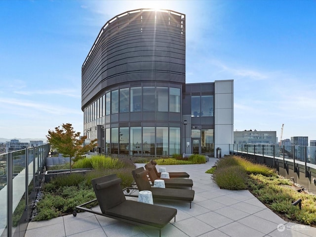 exterior space featuring a patio area and fence