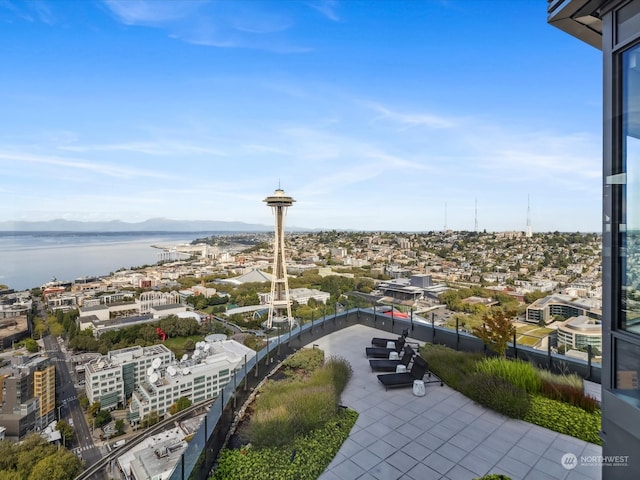 surrounding community featuring a water view