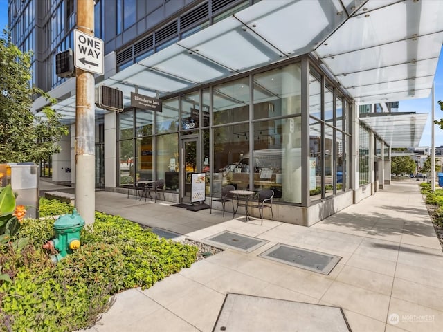 property entrance with a patio