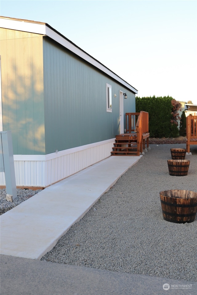 view of property exterior with a patio