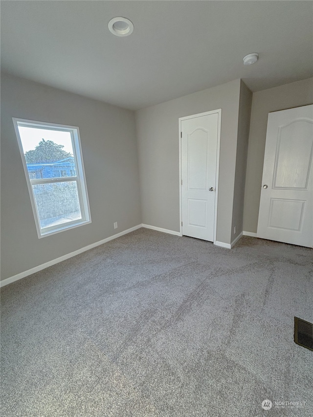 view of carpeted spare room