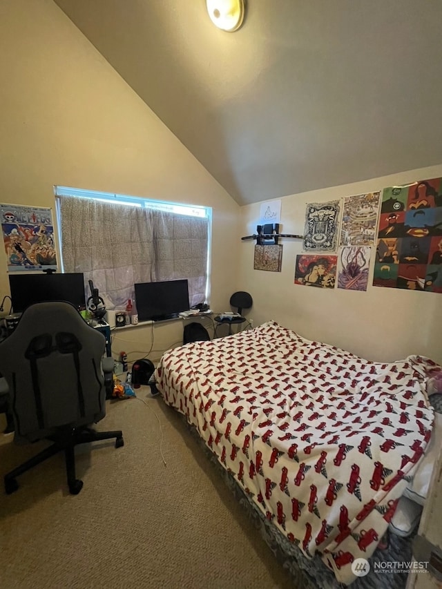 carpeted bedroom with vaulted ceiling