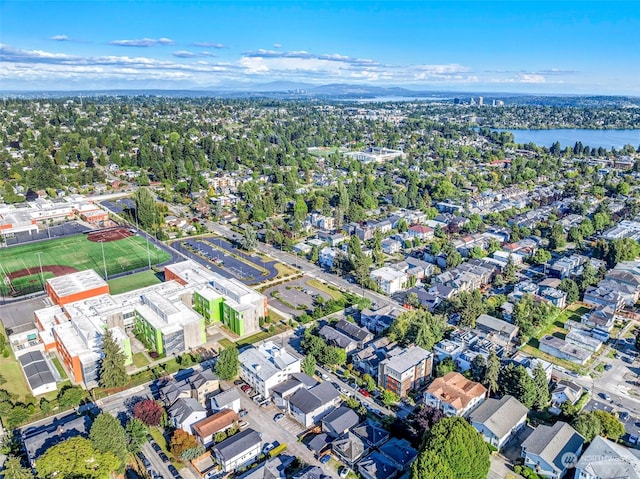 bird's eye view featuring a residential view and a water view