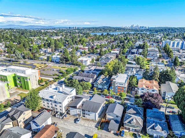 bird's eye view featuring a water view and a residential view