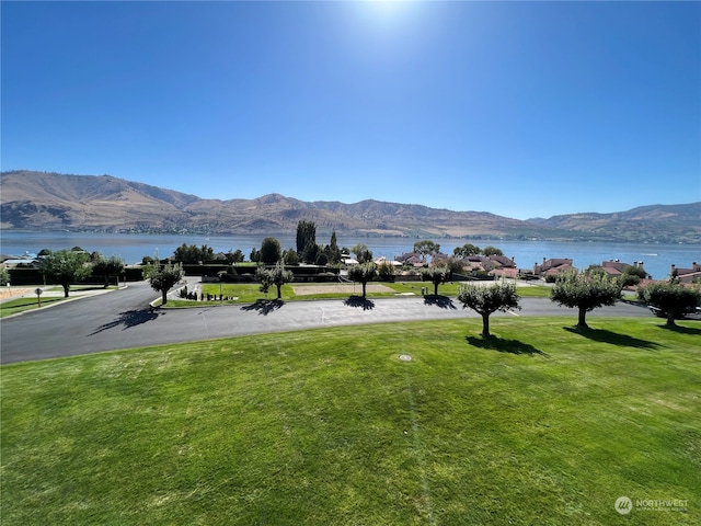 property view of mountains featuring a water view