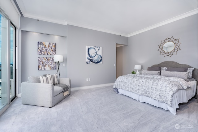 carpeted bedroom featuring ornamental molding