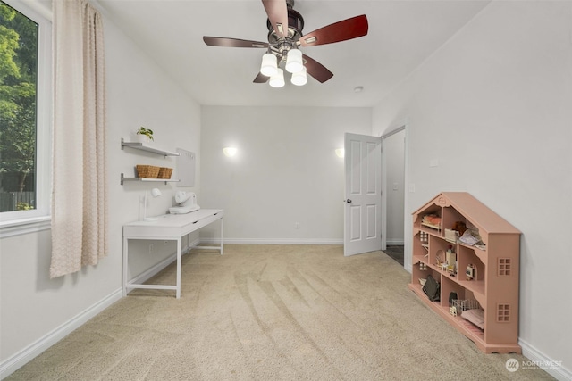 bedroom with light colored carpet and ceiling fan