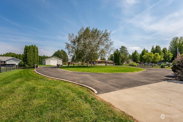 view of property's community featuring a lawn