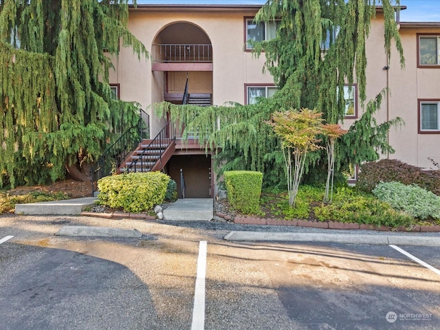 view of property with stairway