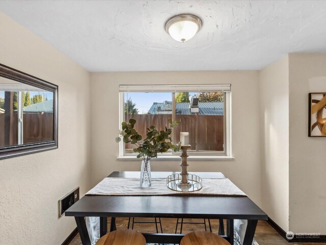dining room with baseboards