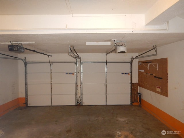 garage featuring a garage door opener