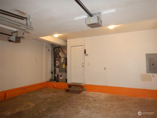 garage featuring heating unit, electric panel, and a garage door opener