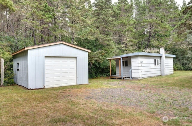 garage with a lawn