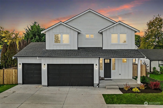 modern farmhouse style home featuring a garage