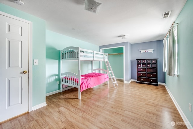 bedroom featuring light wood-type flooring