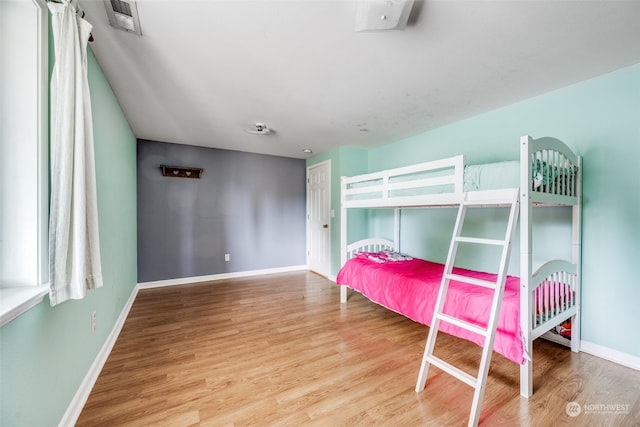 bedroom featuring light hardwood / wood-style flooring