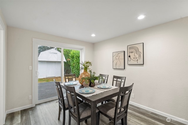 dining area with wood-type flooring