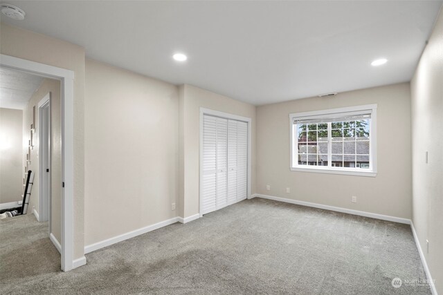 empty room featuring carpet floors