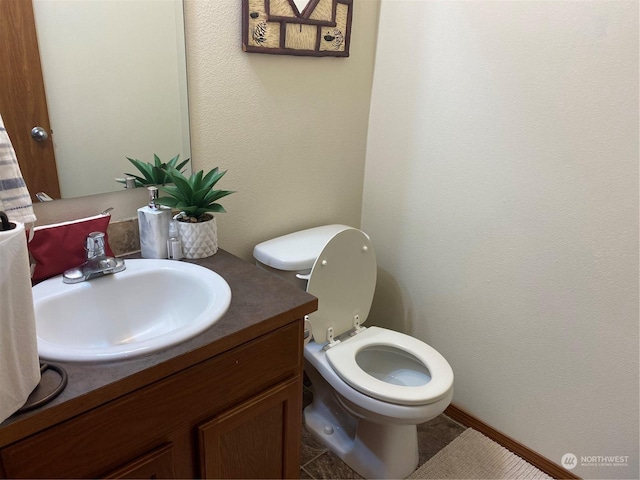 11714 9th Avenue Ct E, Tacoma, WA 98445 - half bath with toilet, vanity, and a textured wall