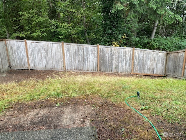 11714 9th Avenue Ct E, Tacoma, WA 98445 - view of yard featuring a fenced backyard