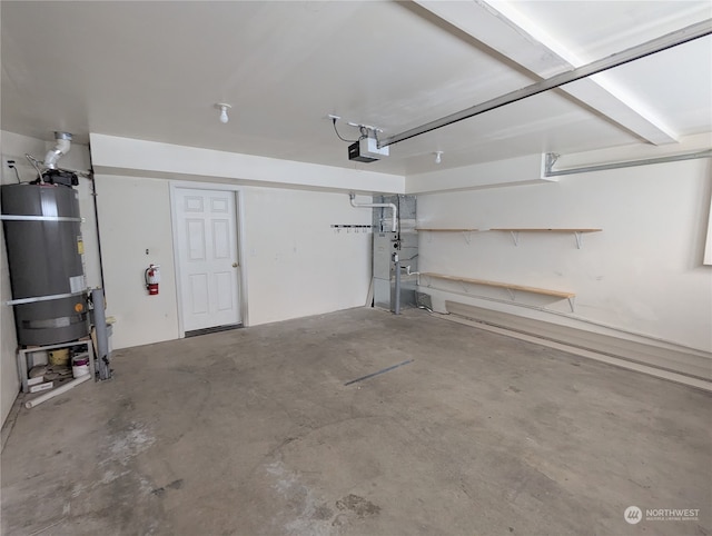 garage featuring water heater and a garage door opener