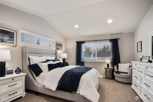 bedroom featuring vaulted ceiling and carpet