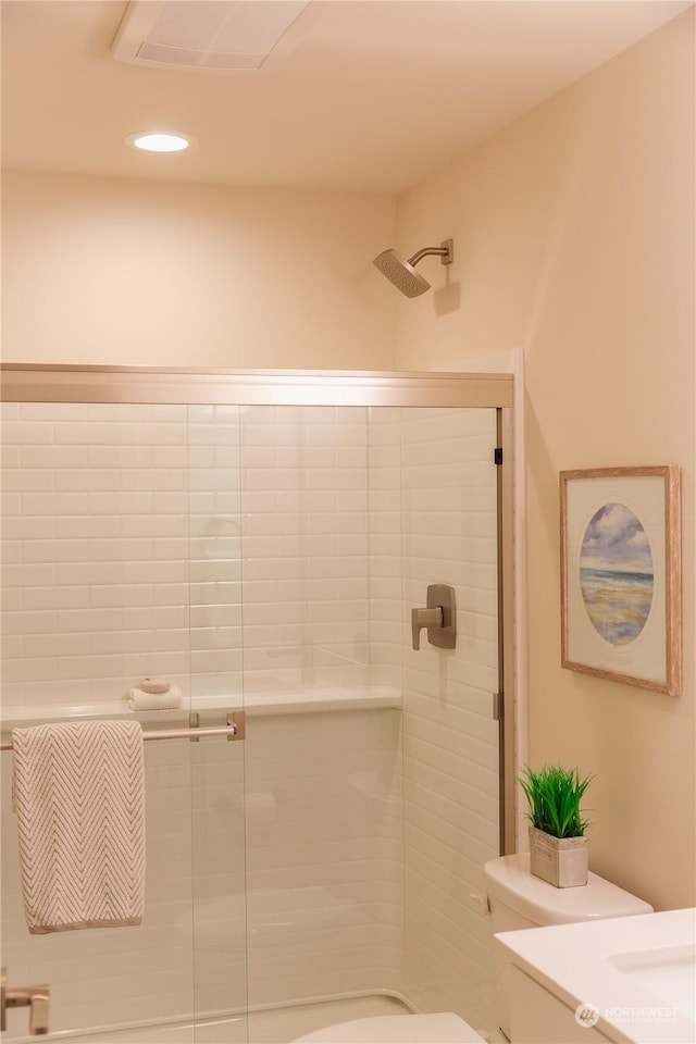 full bathroom featuring visible vents, toilet, recessed lighting, and a stall shower