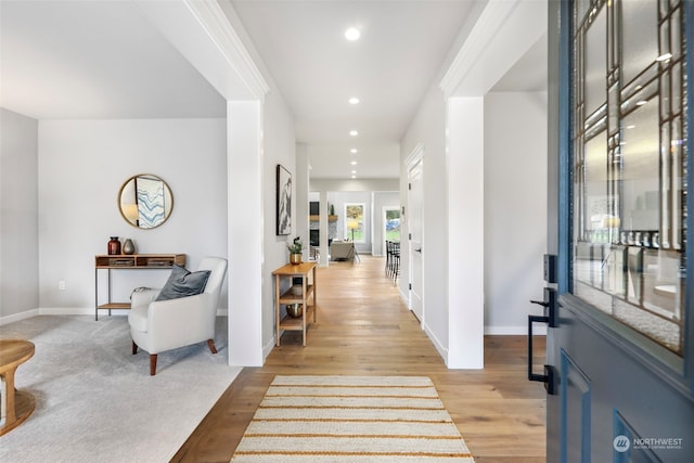 hallway with light wood-type flooring