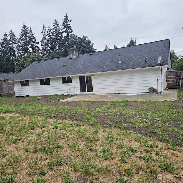 rear view of property with a patio